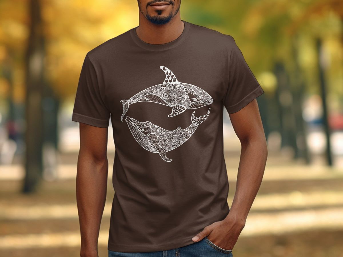 Brown t-shirt with white orca and whale mandala design on chest.