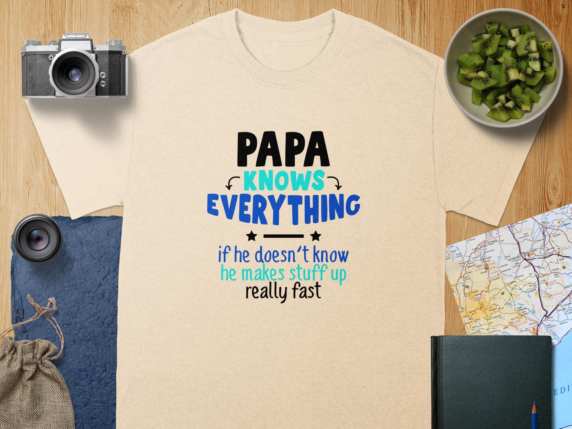 Cream t-shirt with text "PAPA KNOWS EVERYTHING if he doesn't know he makes stuff up really fast".