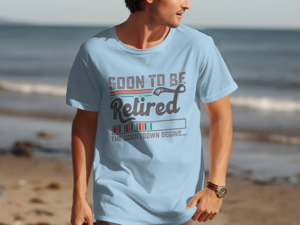 Light blue t-shirt with "Soon to be Retired" and countdown graphic.