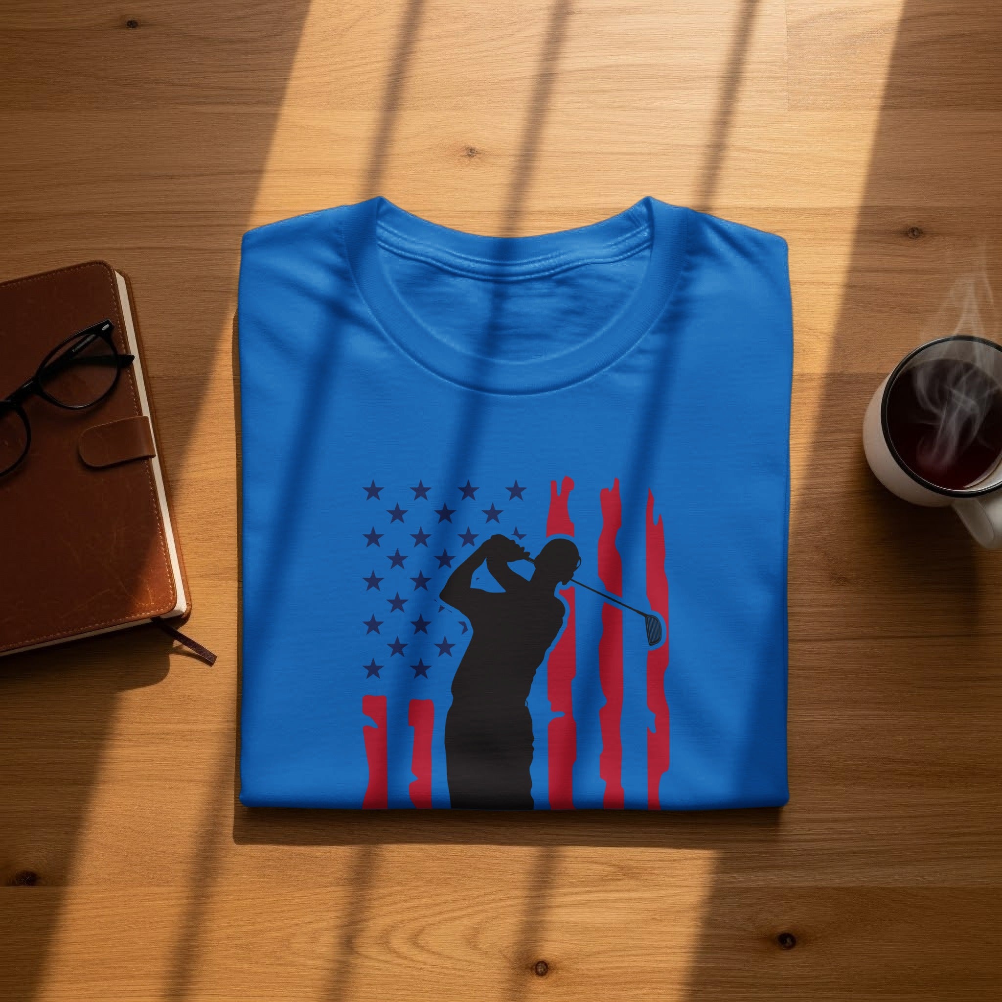 Blue t-shirt with a golfer silhouette and American flag design.