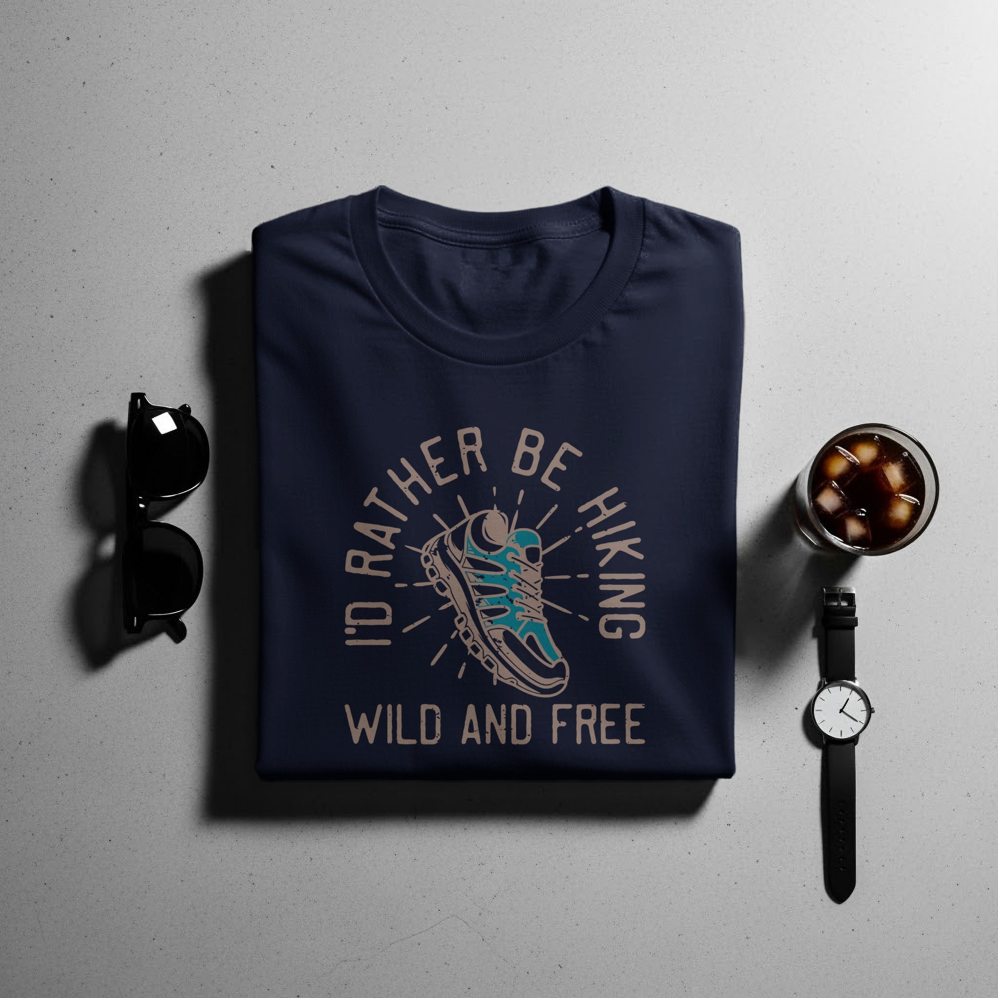 Navy t-shirt with "I'd Rather Be Hiking Wild and Free" text and boot graphic.