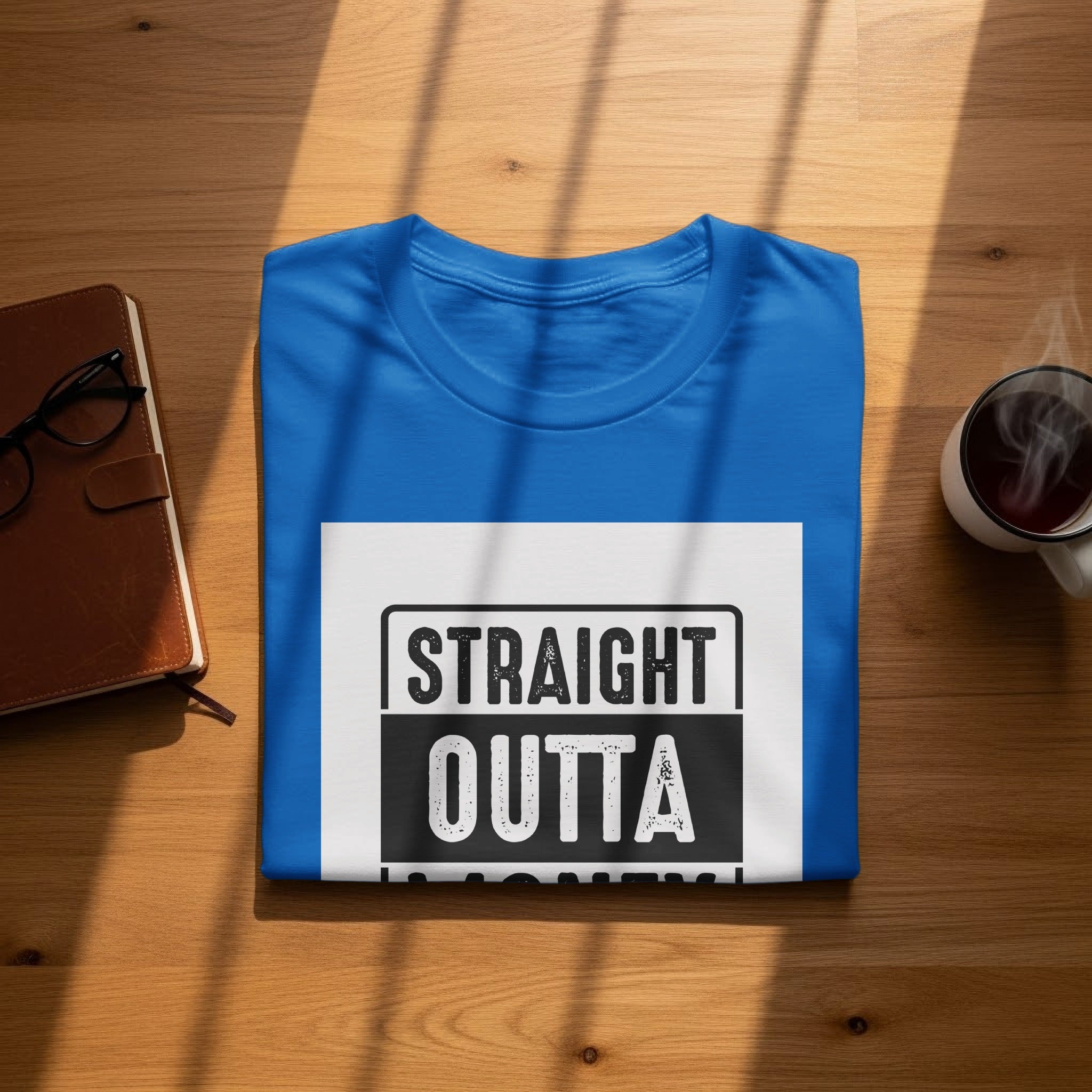 Blue t-shirt with "STRAIGHT OUTTA" text on a white rectangle.