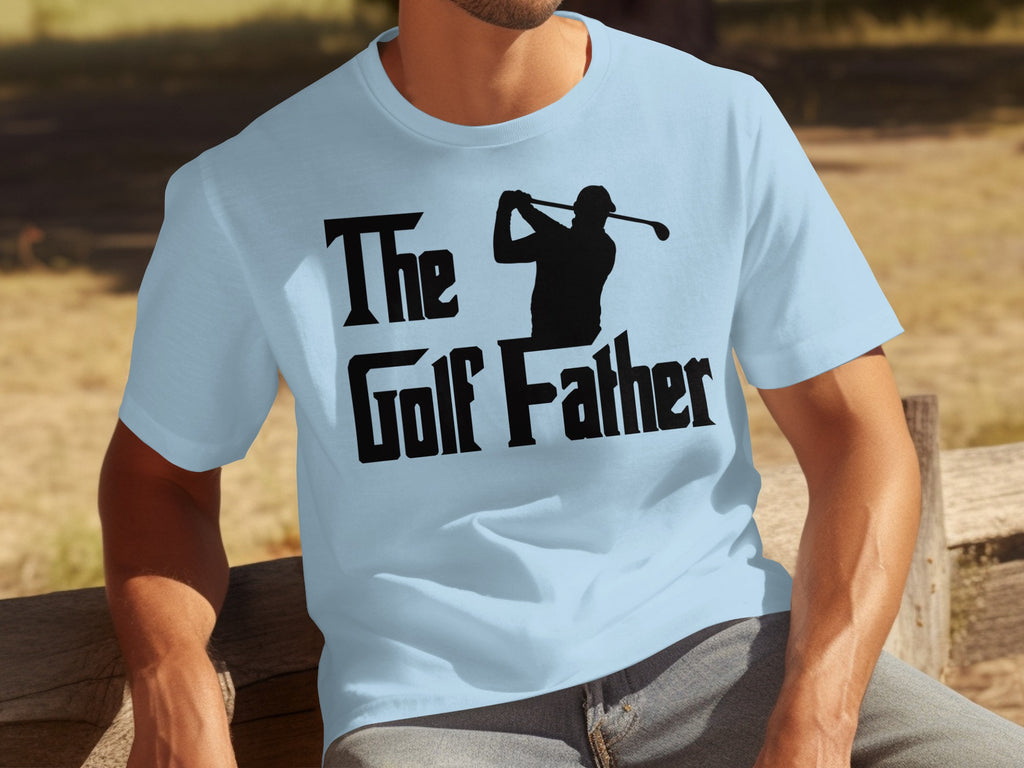 Light blue t-shirt with black text reading "The Golf Father" and a golfer silhouette.