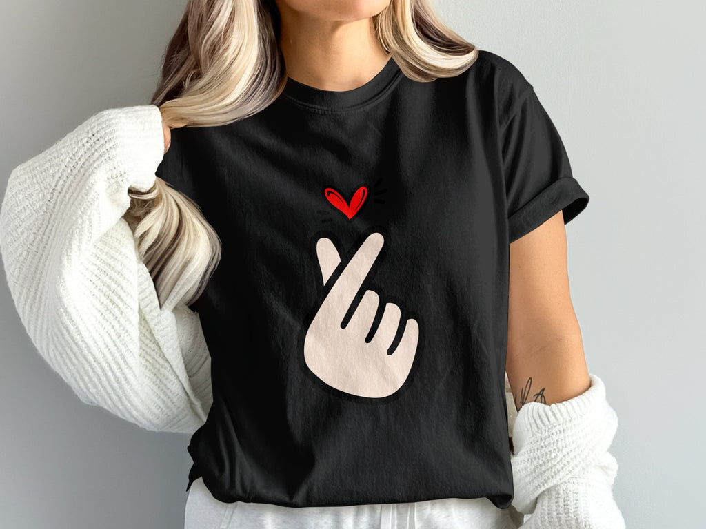 Black t-shirt with a white finger heart and red heart graphic.