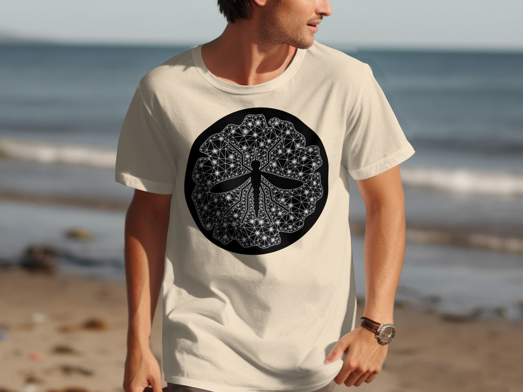 Cream t-shirt with circular black and white geometric dragonfly design.