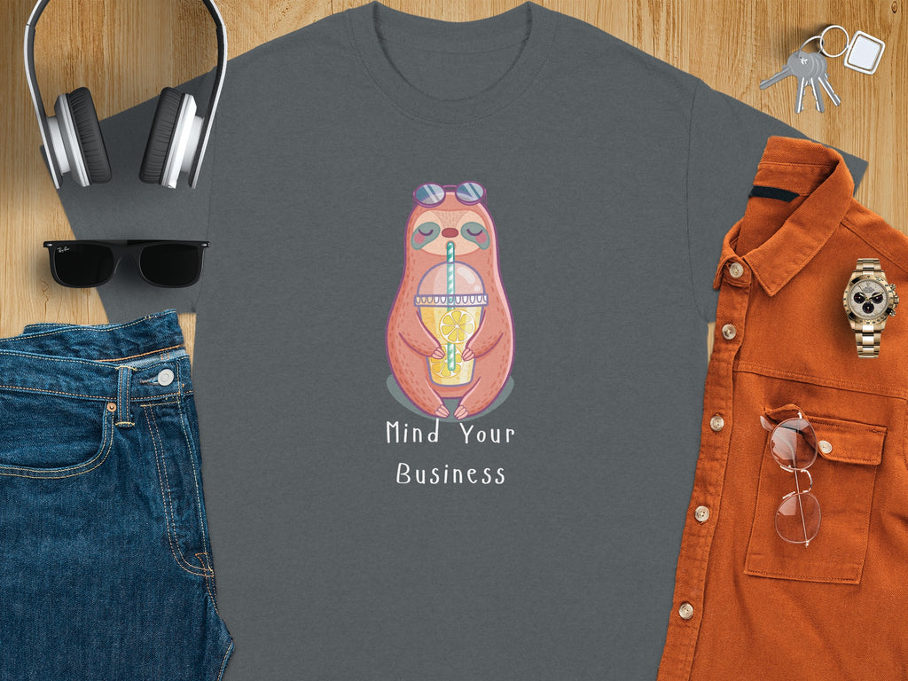 Gray t-shirt with cartoon sloth, sunglasses, and text "Mind Your Business".