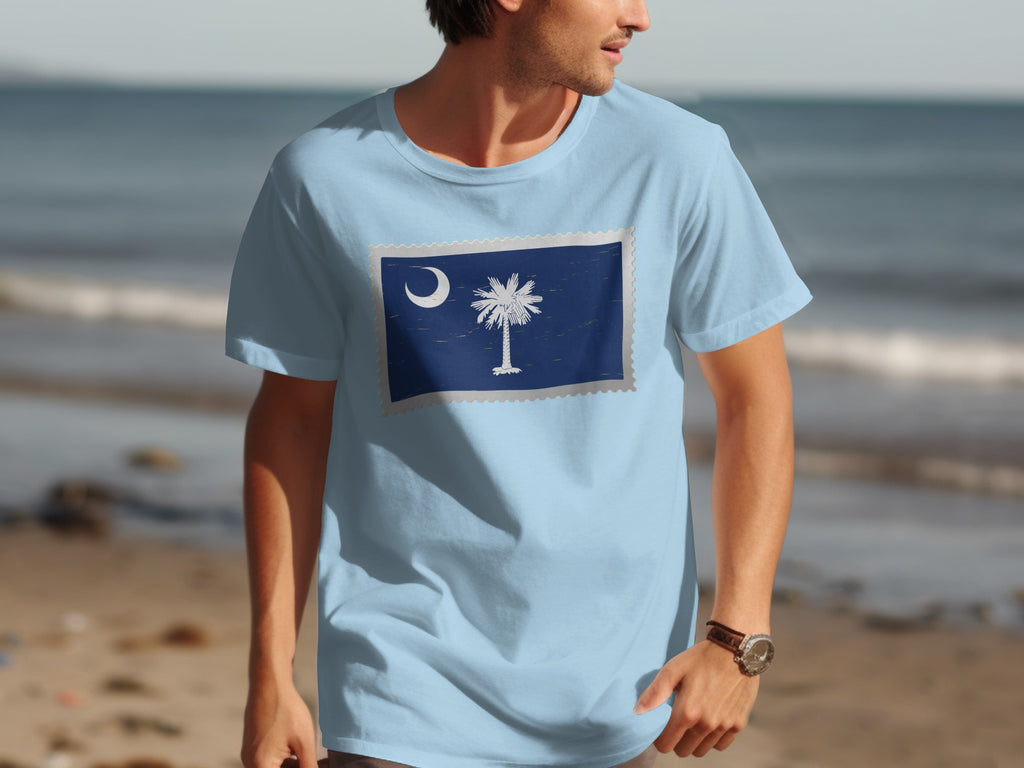Light blue t-shirt with South Carolina flag stamp graphic on chest.