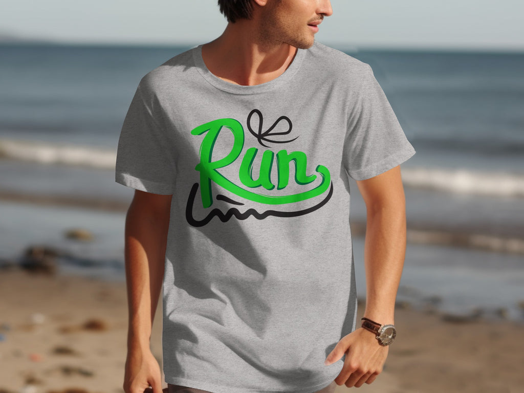 Gray t-shirt with green "Run" text and black accents on a beach background.