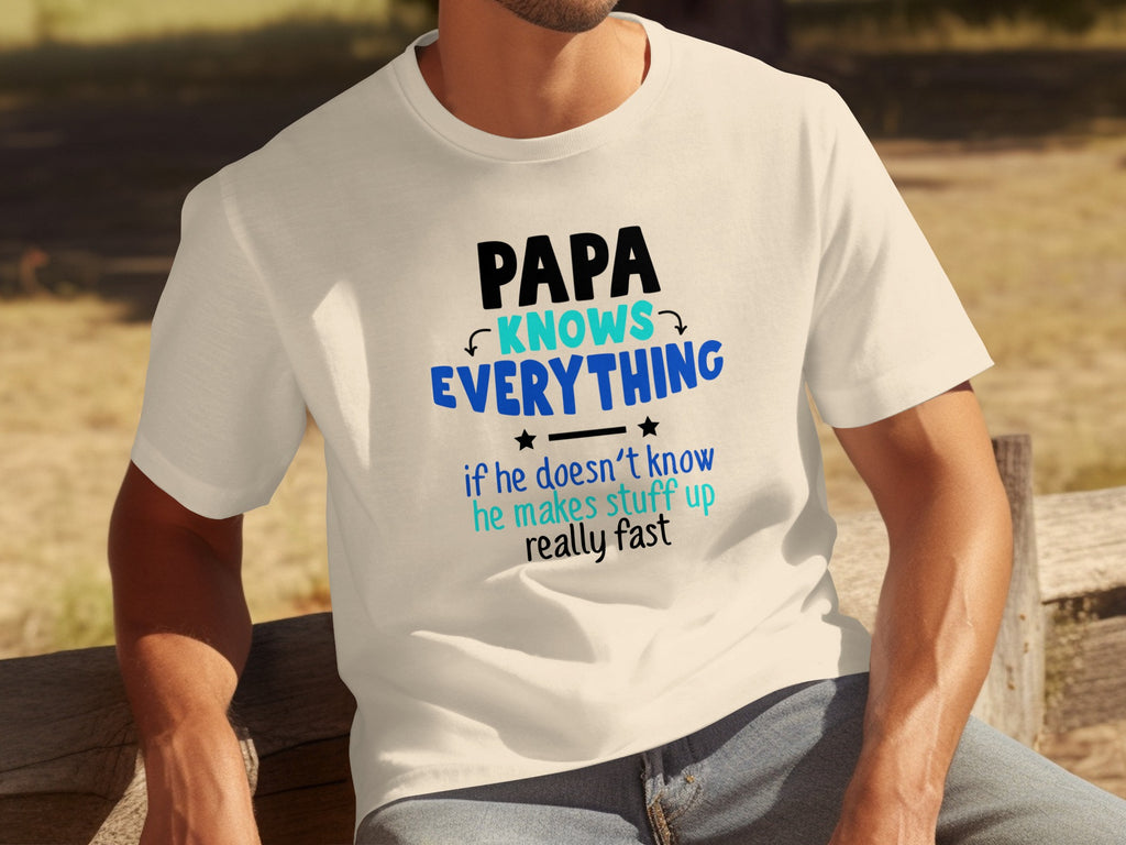 Cream t-shirt with text "PAPA KNOWS EVERYTHING if he doesn't know he makes stuff up really fast."