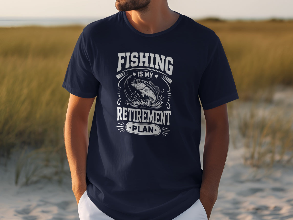 Navy t-shirt with white text "FISHING IS MY RETIREMENT PLAN" and a jumping fish graphic.