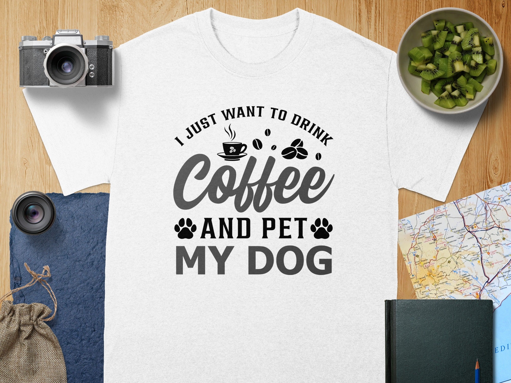 White t-shirt with text: "I JUST WANT TO DRINK Coffee AND PET MY DOG".