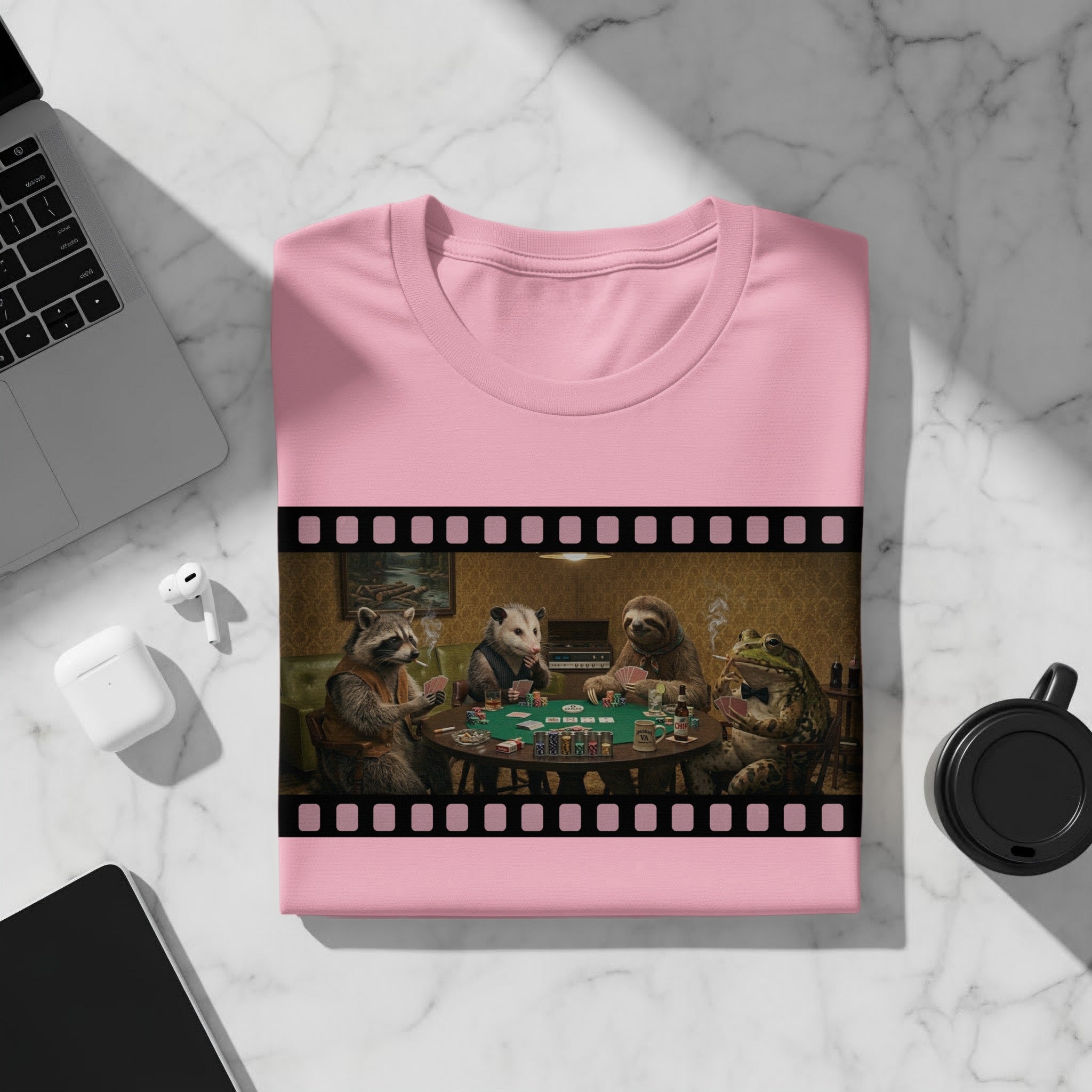 Animals play poker on a pink t-shirt featured with a film strip border.