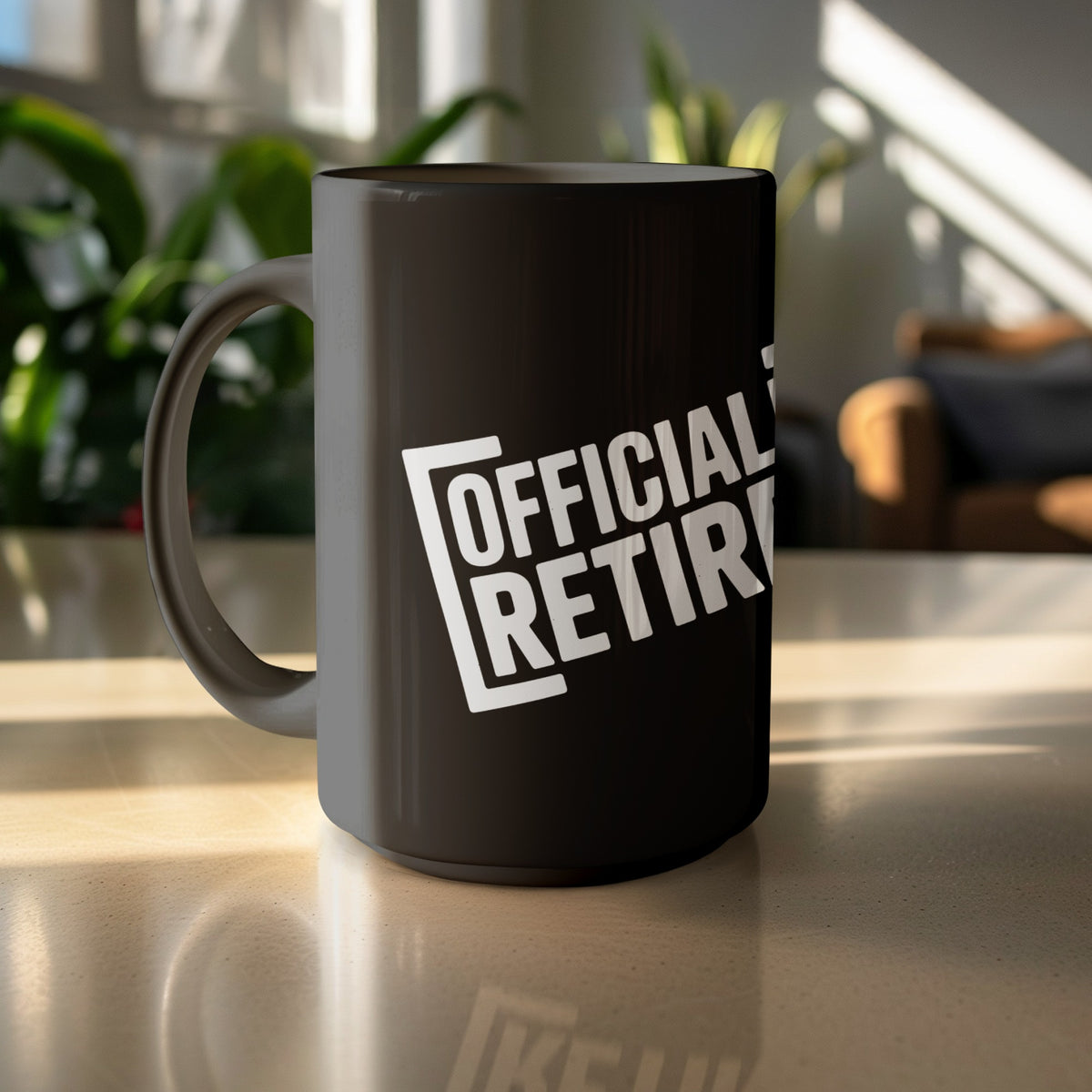 Black mug with white text "OFFICIAL RETIRE" in bold lettering.