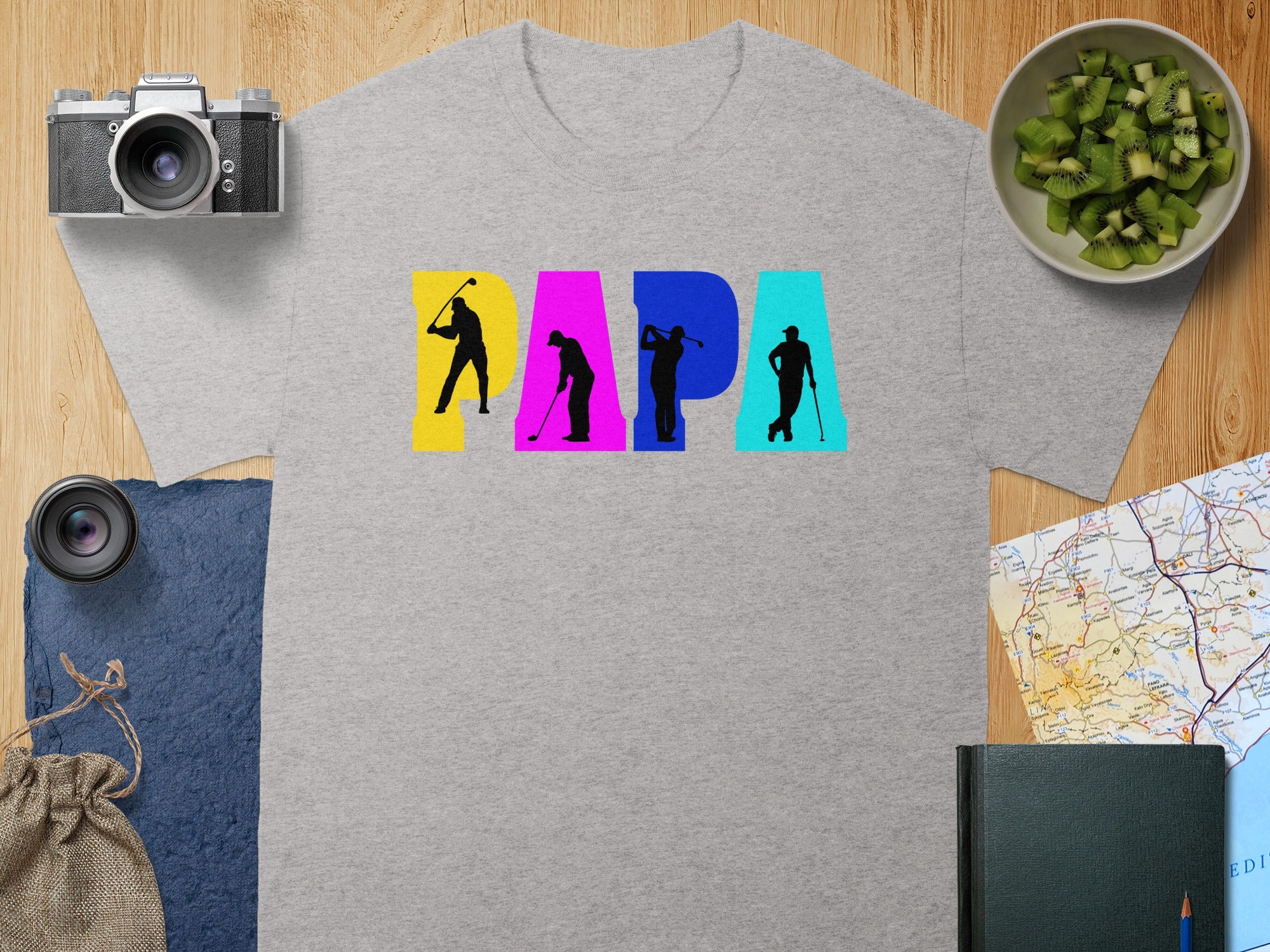 Grey t-shirt with colorful "PAPA" text featuring golfer silhouettes.