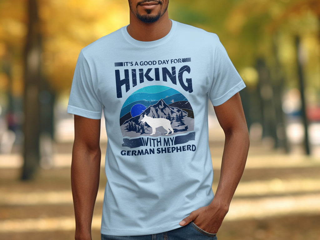 Light blue t-shirt with mountains and dog graphic: "It's a good day for hiking with my German Shepherd."