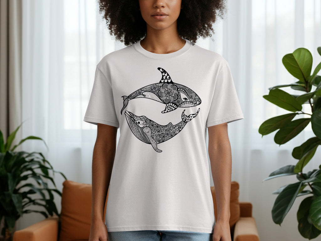 White t-shirt with black mandala-style orca and whale graphic.