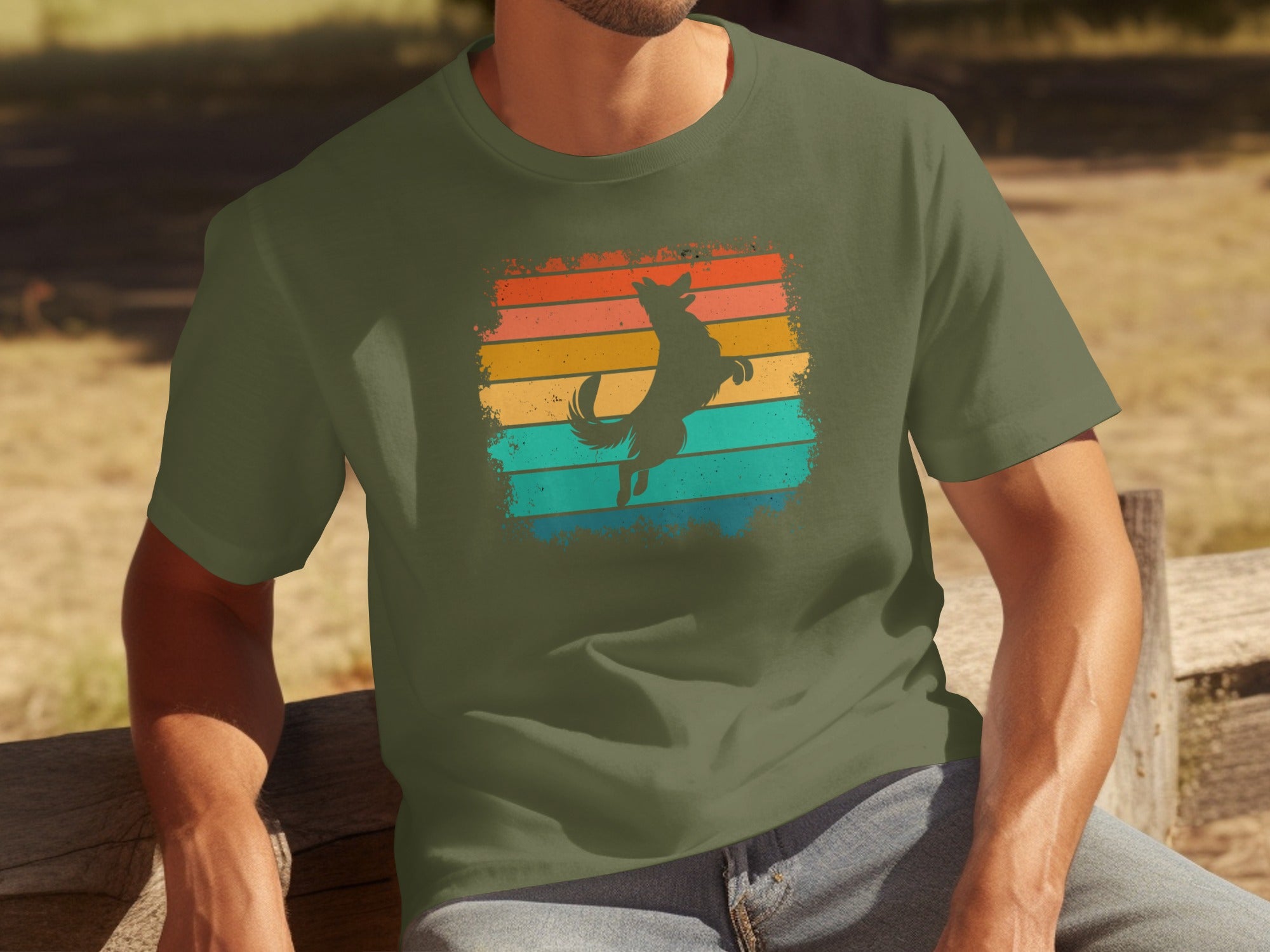 Dark green t-shirt with silhouette of a dog jumping against a retro striped background.