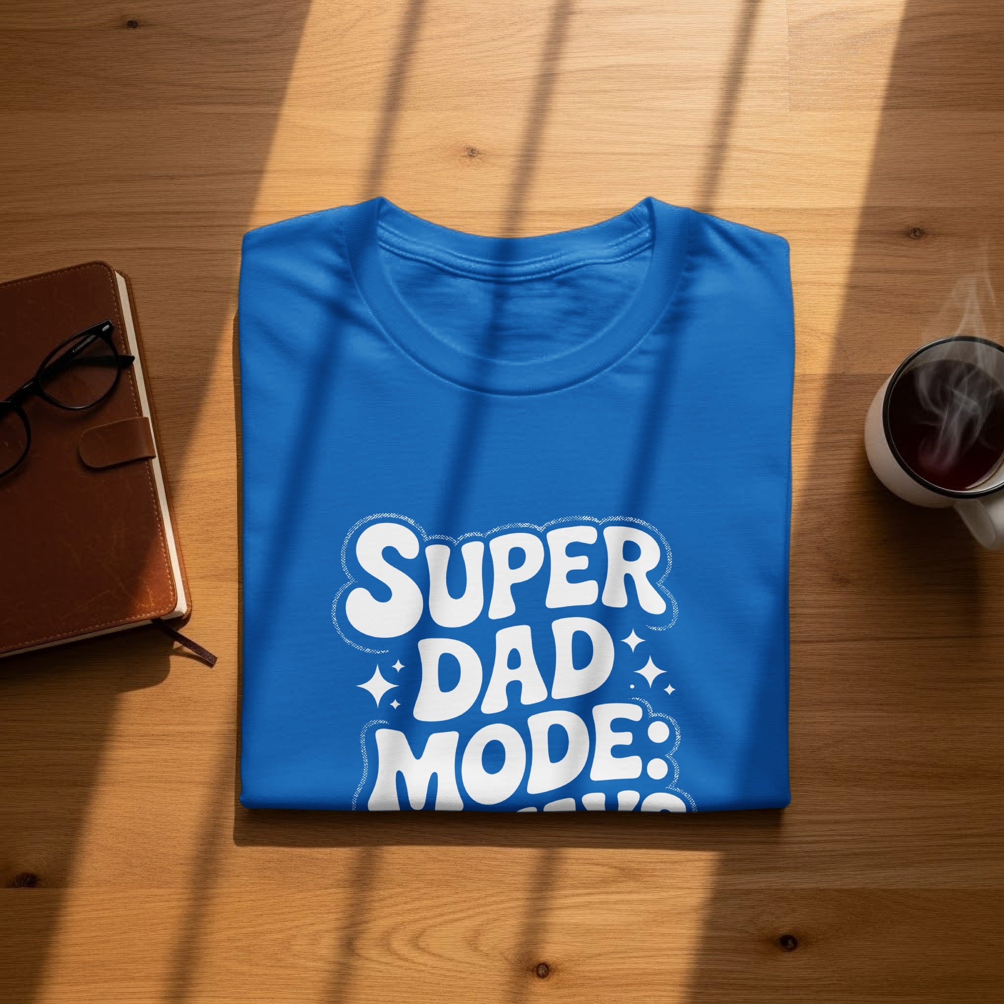 Blue t-shirt with "SUPER DAD MODE:" in white text.