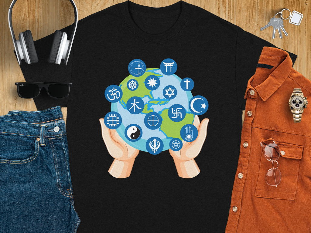 Black t-shirt with hands holding a globe featuring various religious and cultural symbols.