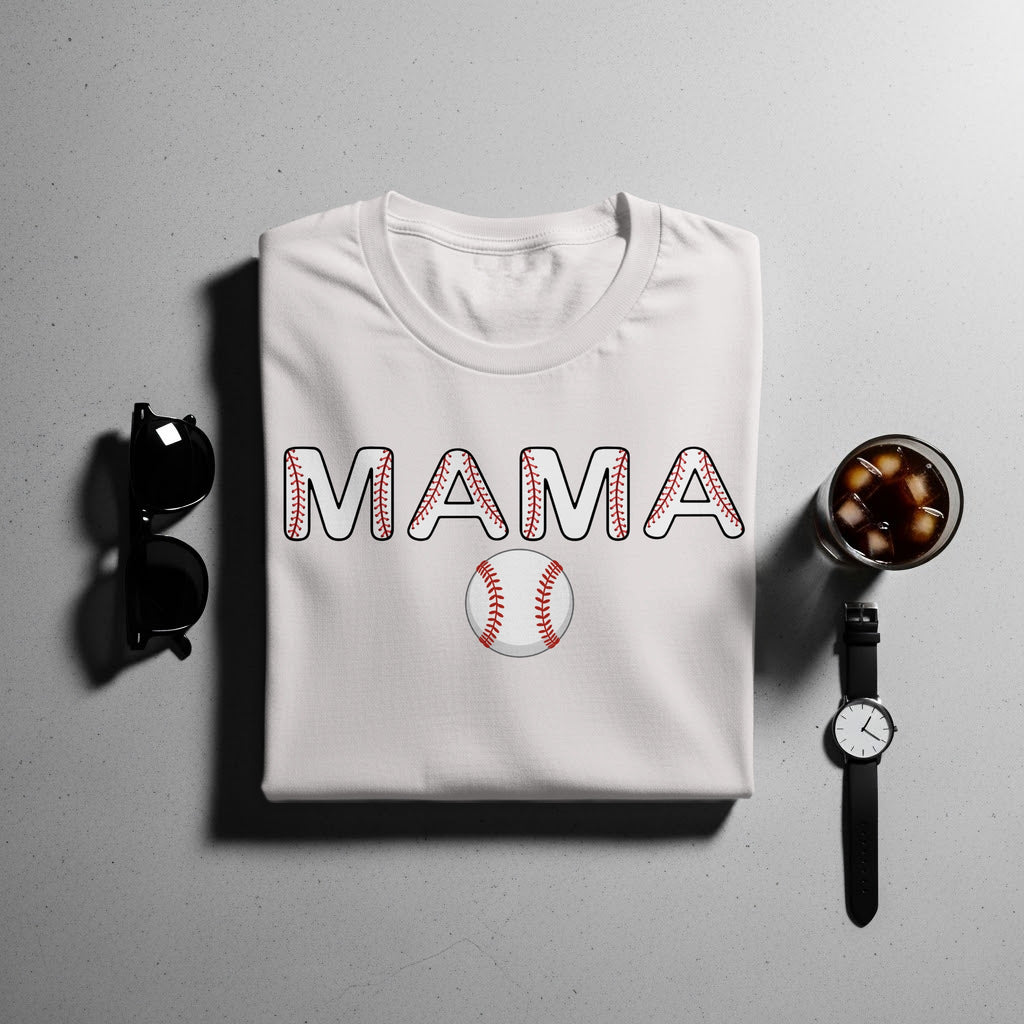 White t-shirt with "MAMA" text and baseball design and baseball below.