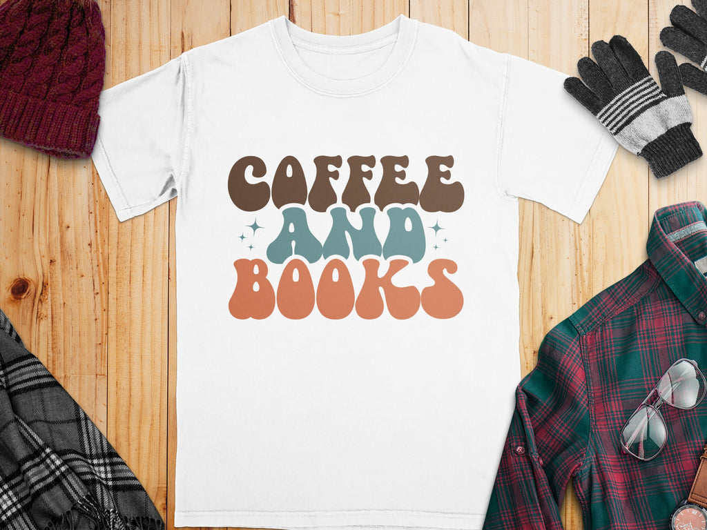 White t-shirt with brown, teal, and orange "Coffee And Books" text.