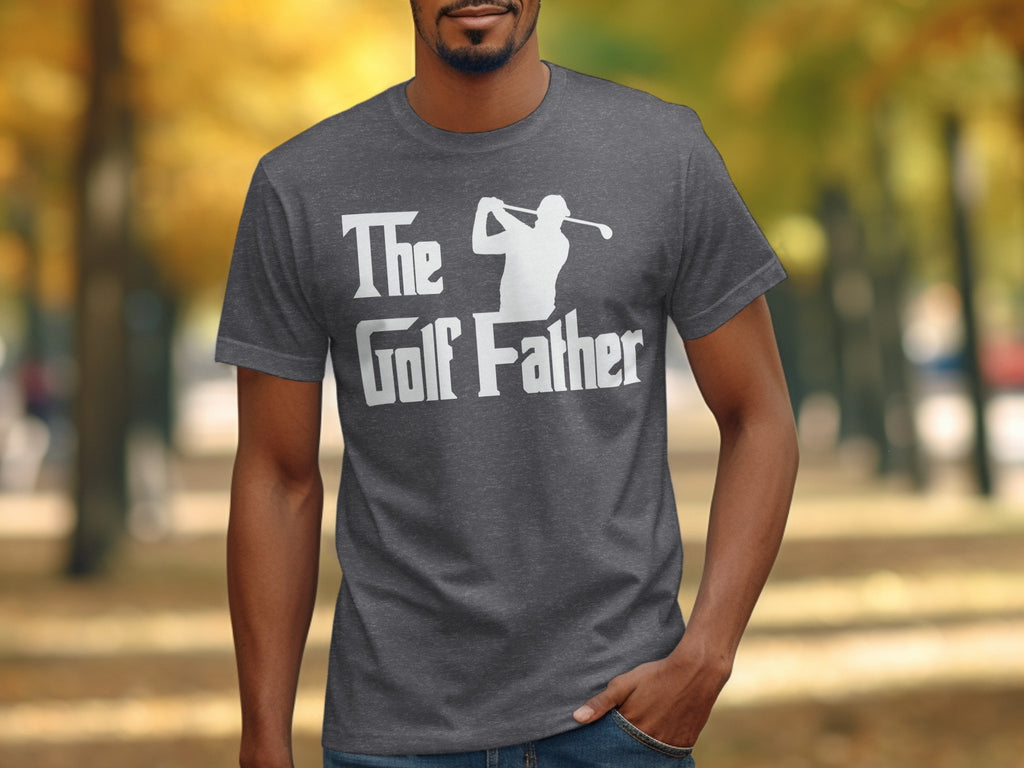 Dark charcoal t-shirt with white text and golf silhouette reading "The Golf Father".