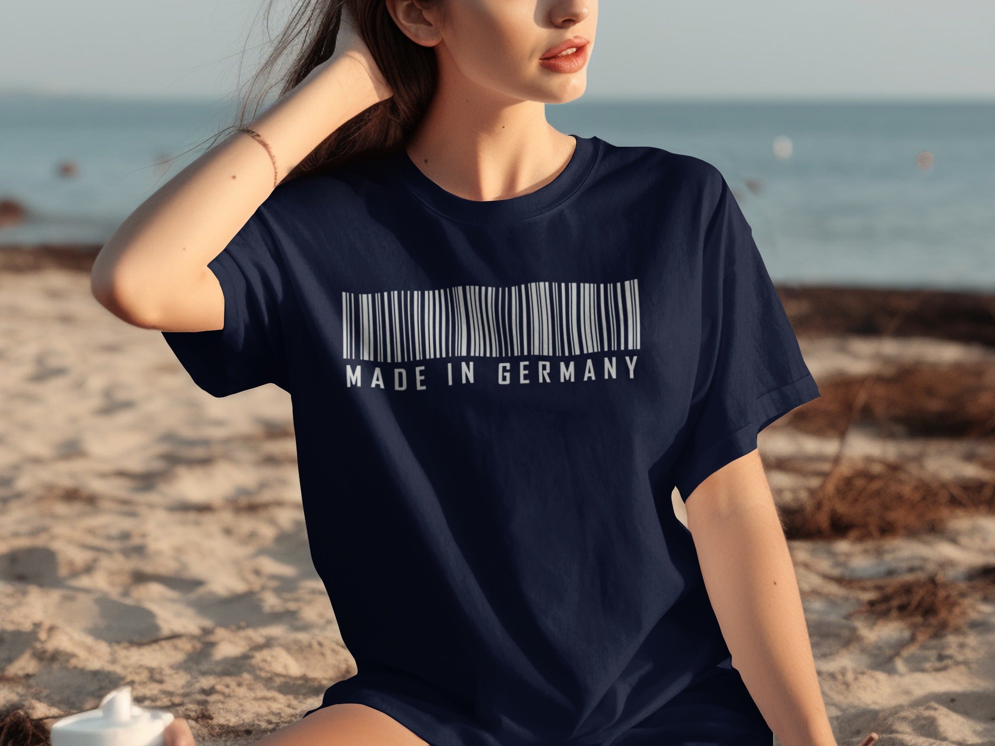Navy t-shirt with "MADE IN GERMANY" in a barcode design.