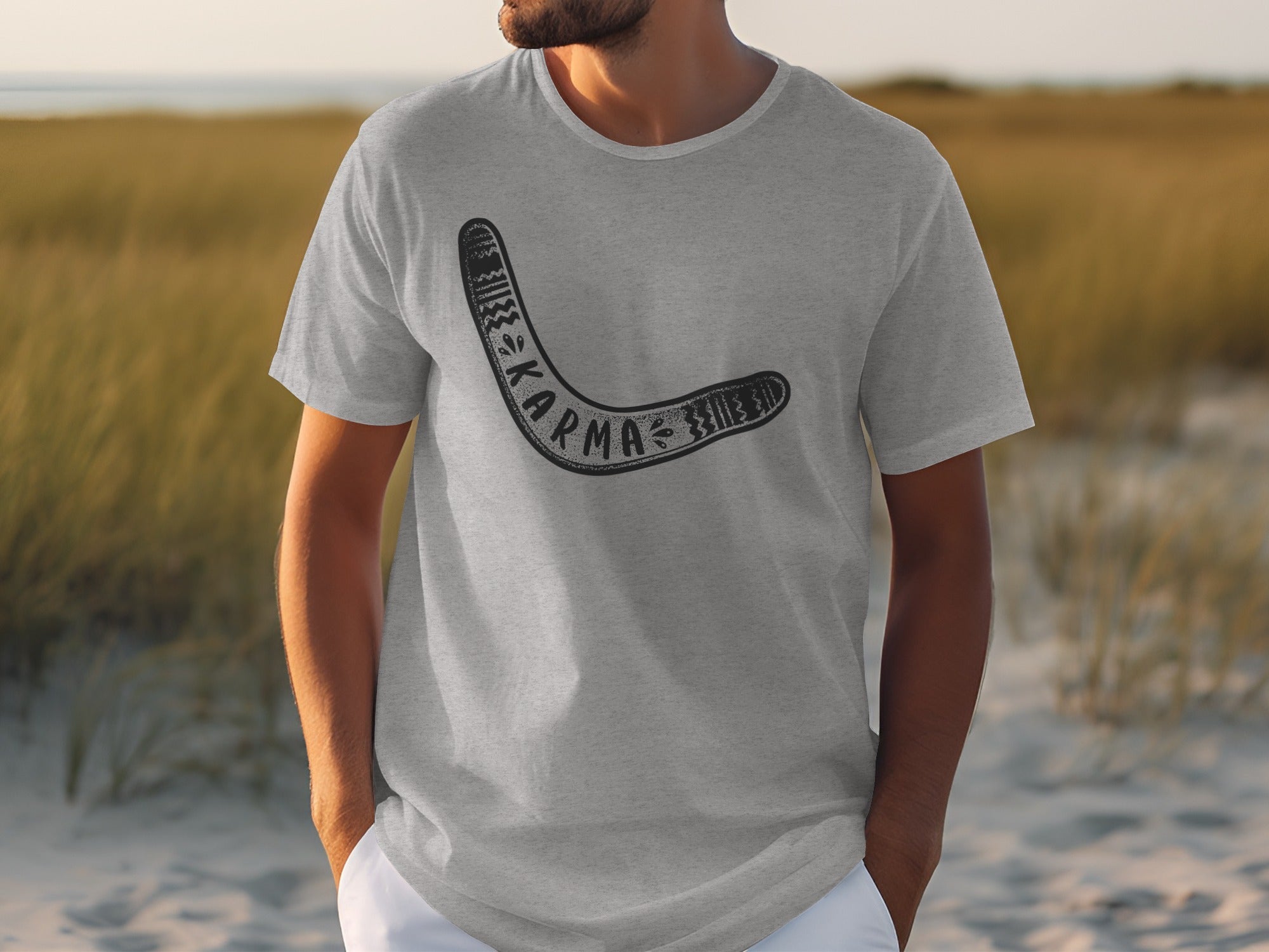 Gray t-shirt with a black boomerang graphic and "karma" text.