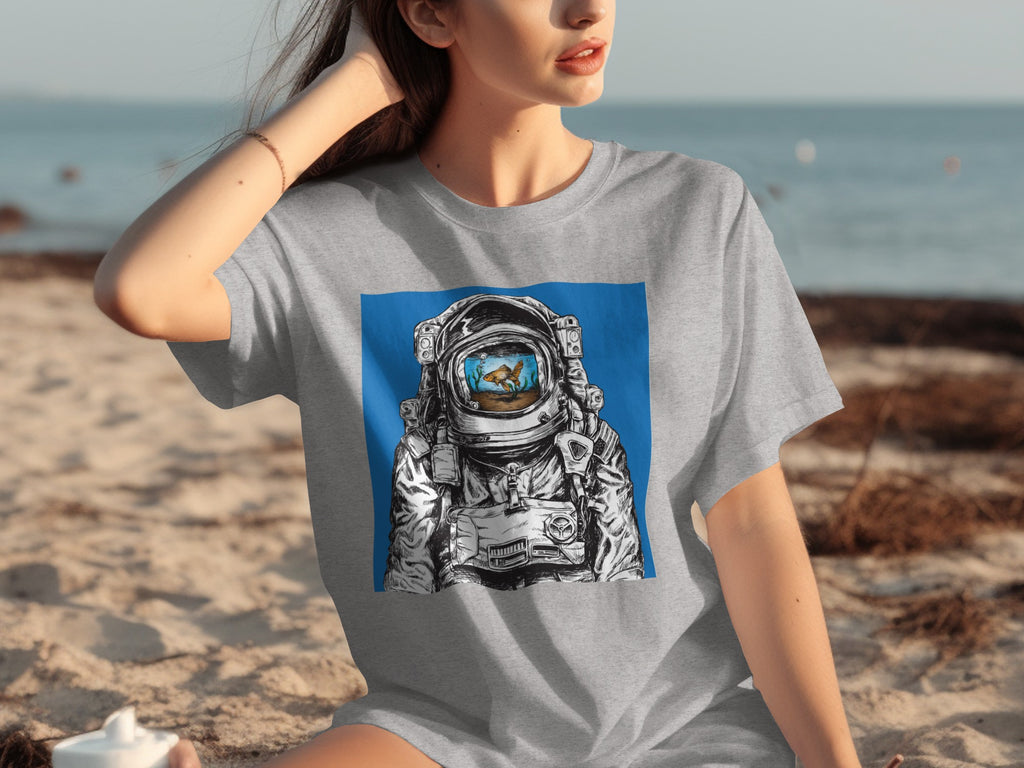 T-shirt graphic of astronaut helmet with goldfish and plants inside.