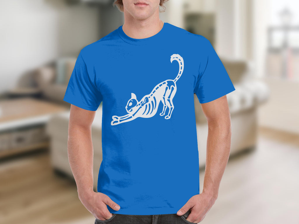 Blue t-shirt with a white skeleton cat graphic stretching.