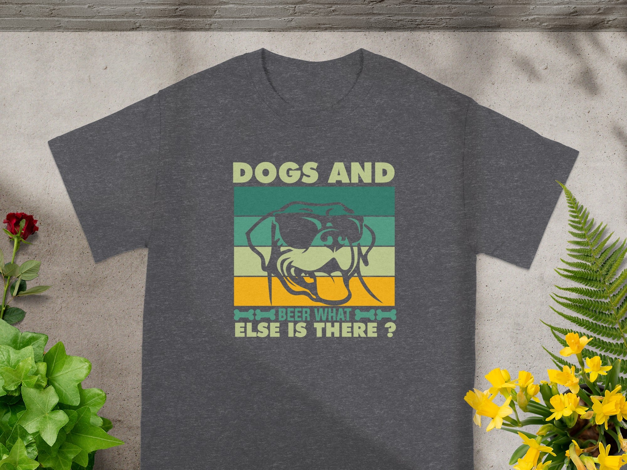 Dark grey t-shirt with dog graphic and text "Dogs and beer what else is there?".
