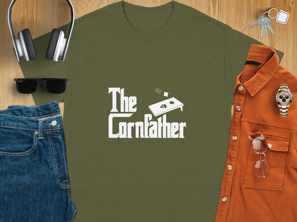 Green t-shirt with "The Cornfather" slogan and cornhole graphic.