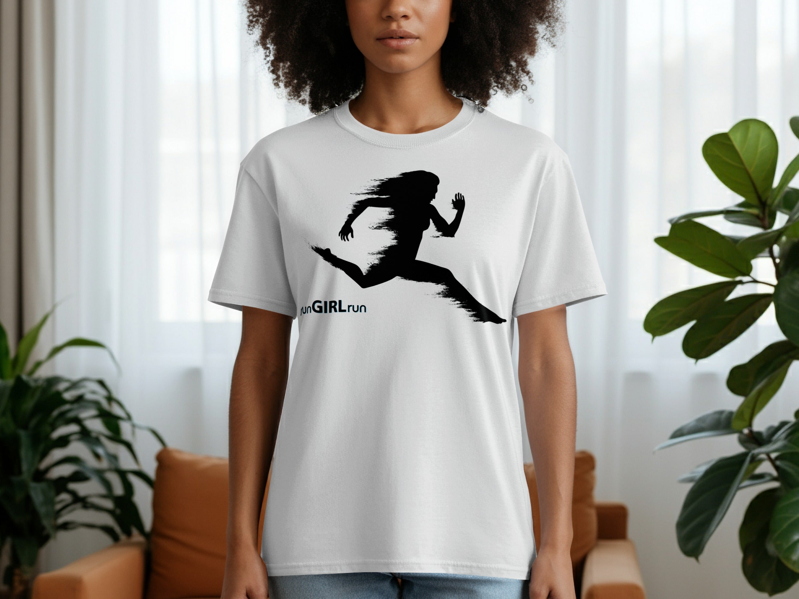 White t-shirt with black graphic of running woman and text "runGIRL run."