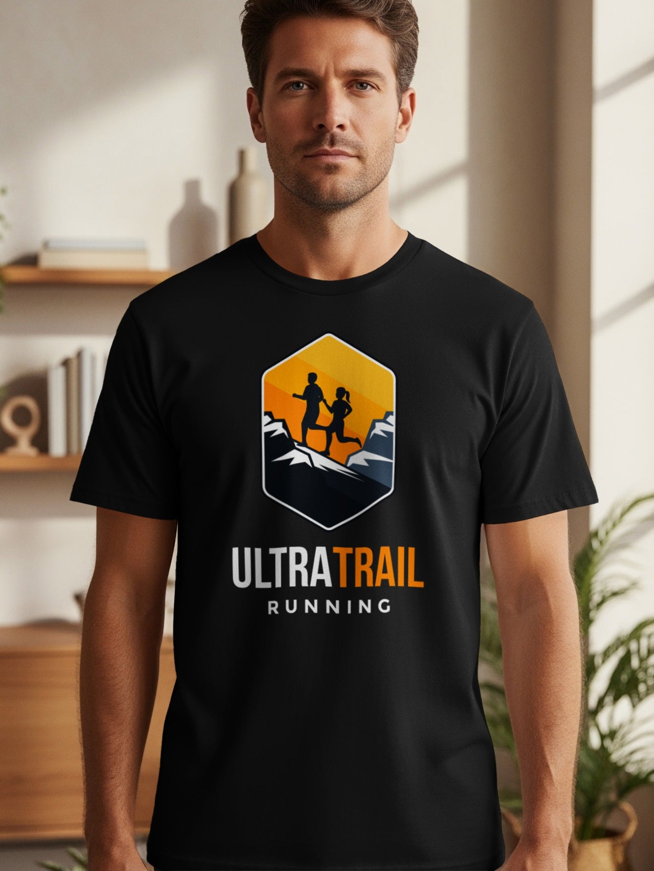 Black t-shirt with "ULTRA TRAIL RUNNING" logo featuring silhouette runners on mountains.