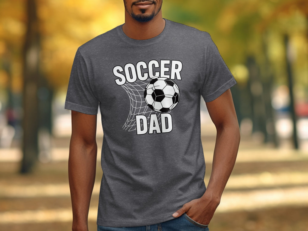 Dark gray t-shirt with "SOCCER DAD" and a soccer ball in a net graphic.