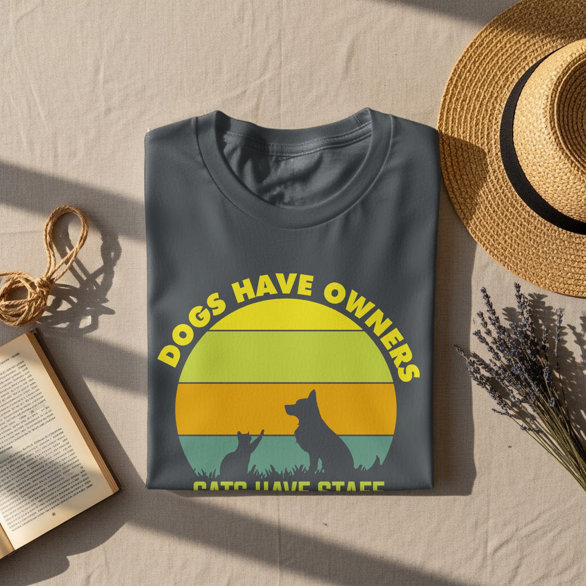 Gray t-shirt with "DOGS HAVE OWNERS CATS HAVE STAFF" text and animal silhouettes.