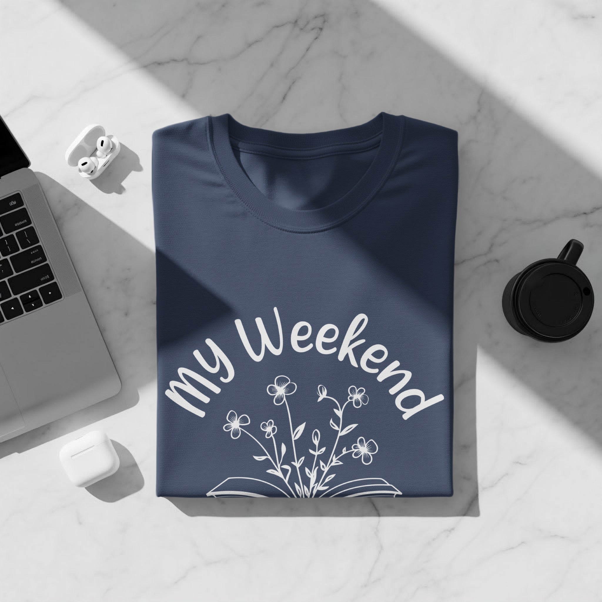 Navy t-shirt with white text "my Weekend" and floral design.