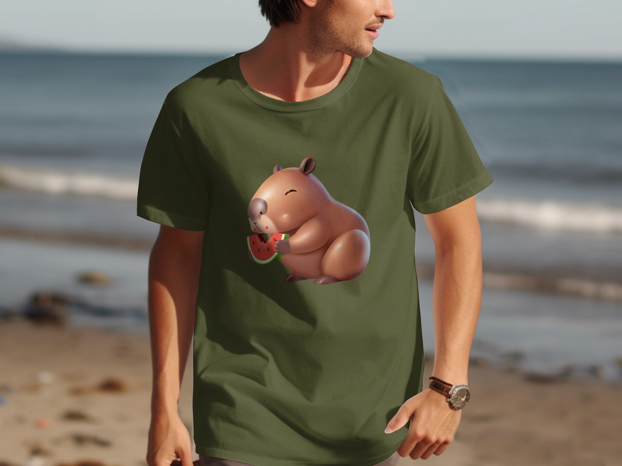 Olive green t-shirt with a cartoon capybara eating watermelon graphic.
