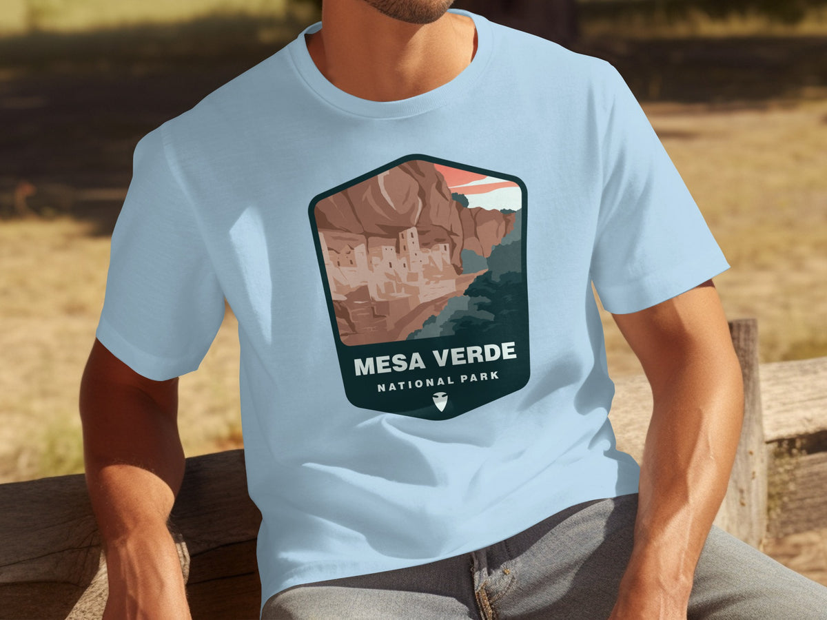 Light blue t-shirt with Mesa Verde National Park graphic featuring cliff dwellings.