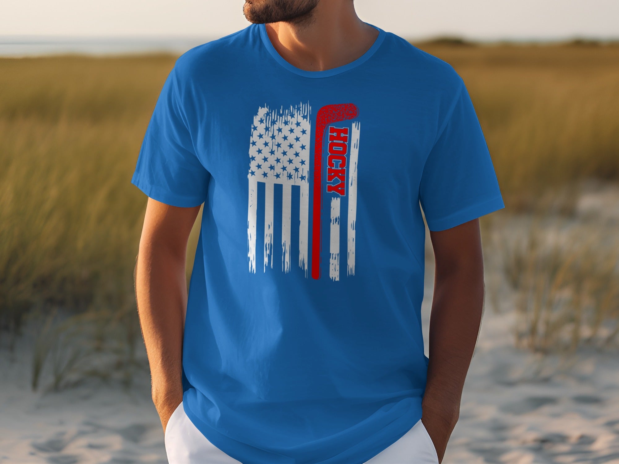 Blue t-shirt with distressed American flag and red hockey stick graphic.