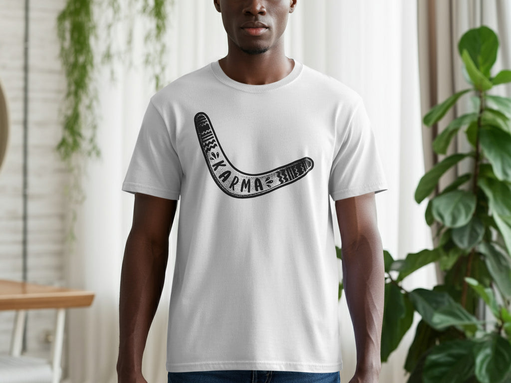 Man wearing a white t-shirt with a black boomerang design and the word "KARMA".