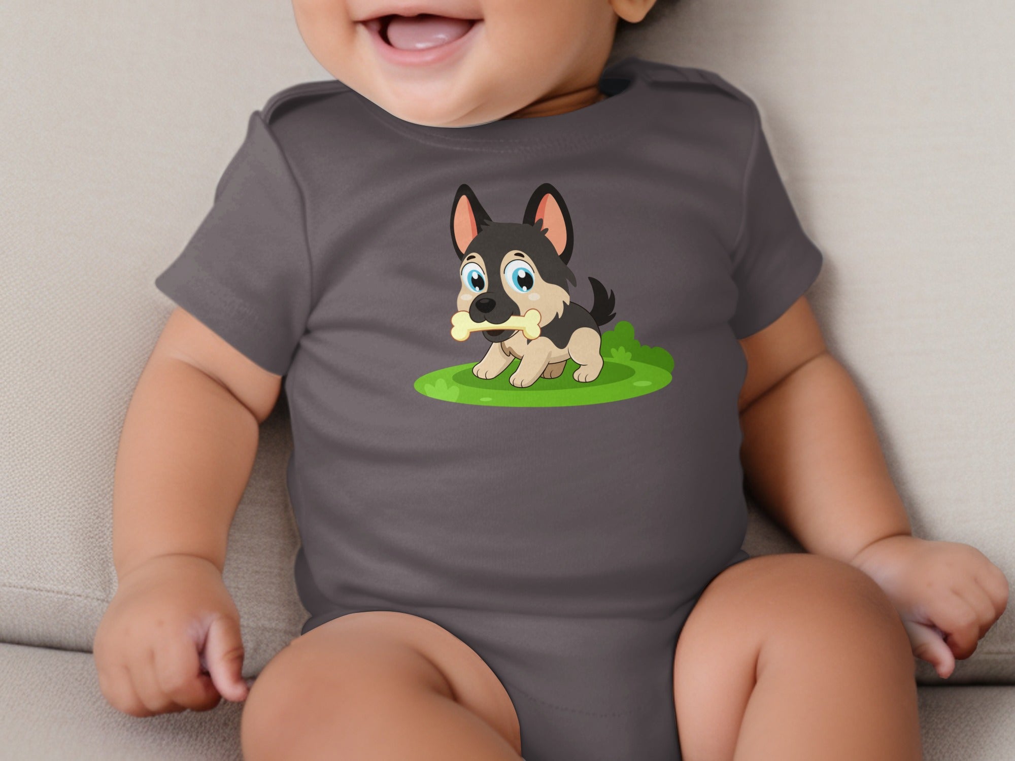 Gray baby onesie with cartoon German Shepherd puppy holding a bone.