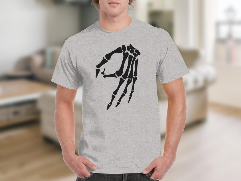 Grey t-shirt with a black skeleton hand making the "okay" gesture.