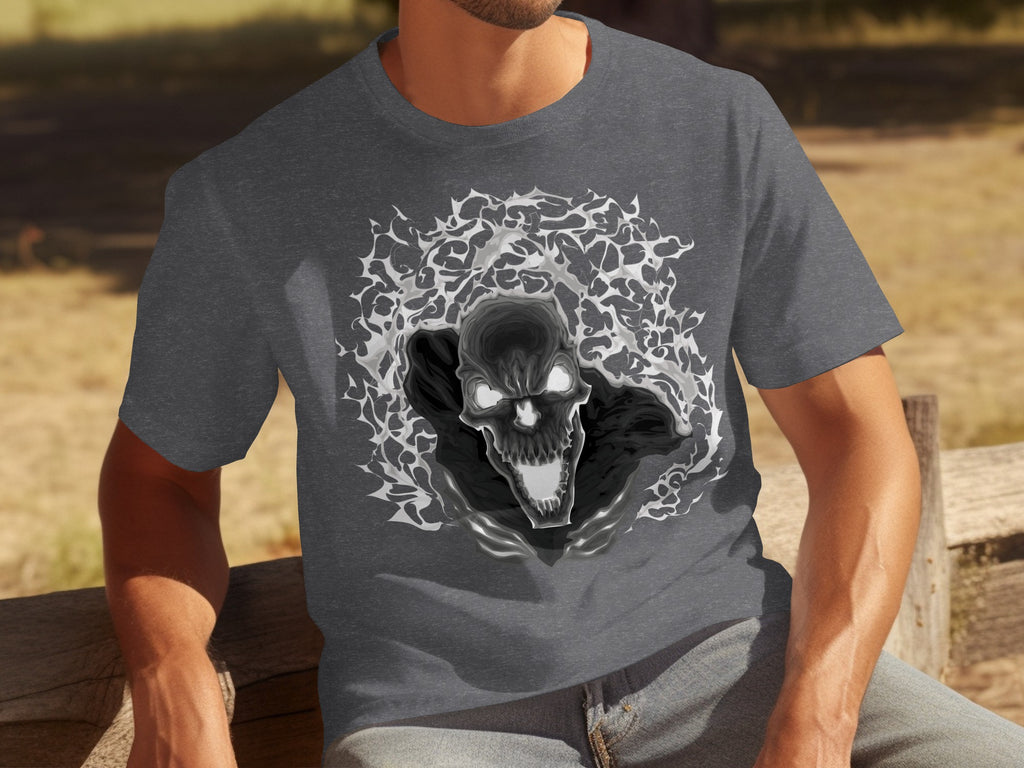 Dark grey t-shirt with a black and white skull graphic surrounded by smoke or energy.
