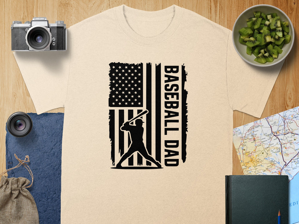 T-shirt with black baseball player silhouette and "BASEBALL DAD" text on flag design.