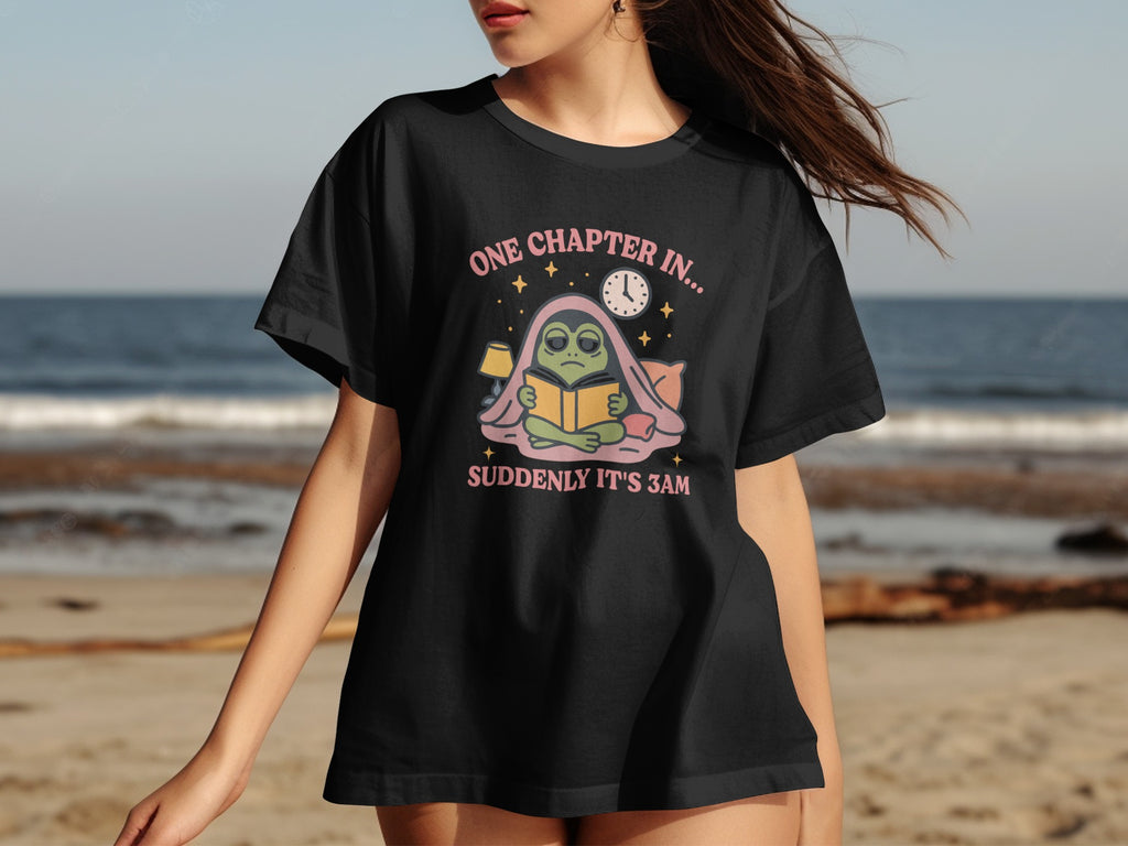 Black t-shirt with alien reading and text "ONE CHAPTER IN... SUDDENLY IT'S 3AM".