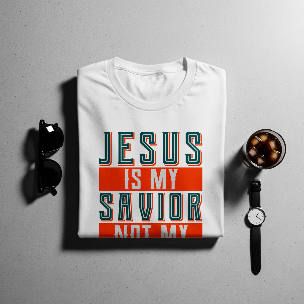 White t-shirt with "JESUS IS MY SAVIOR NOT MY" text on front.