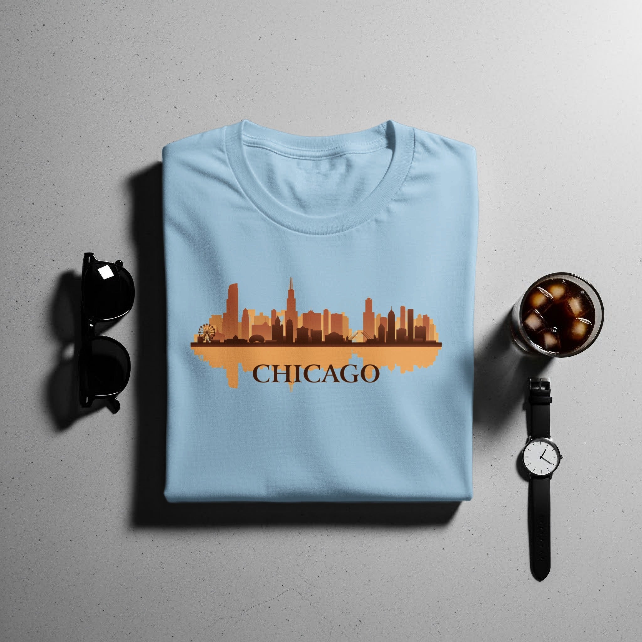 Light blue t-shirt with a Chicago skyline graphic and the word Chicago.