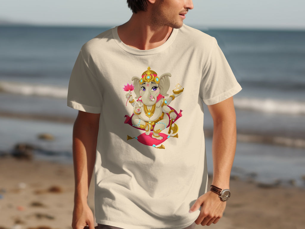 Cream t-shirt with a cartoon Ganesha design, holding a lotus and sweets.