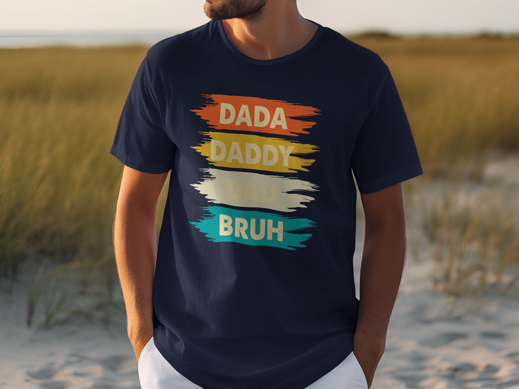 Navy t-shirt with "DADA DADDY DAD BRUH" in brushstroke text.